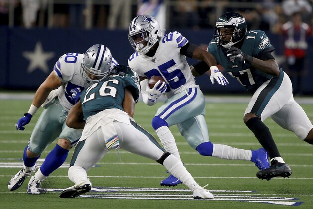 Dallas Cowboys free safety Xavier Woods (25) returns an interception as Philadelphia Eagles wide receiver Alshon Jeffery (17) gives chase in the second half of an NFL football game in Arlington, Texas, Sunday, Oct. 20, 2019. The Cowboys' Sean Lee (50) blocks middle linebacker Duke Riley (26) on the play. (AP Photo/Ron Jenkins)