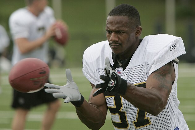 New Orleans Saints wide receiver Joe Horn works on a ball receiving drill Friday, July 28, 2006, at the football team's training facility at Millsaps College in Jackson, Miss. (AP Photo/Rogelio V. Solis)