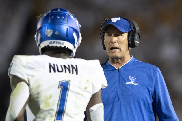Buffalo head coach Lance Leipold talks with wide receiver Antonio Nunn (1) during the second quarter of an NCAA college football game against Penn State in State College, Pa., on Saturday, Sept. 7, 2019. (AP Photo/Barry Reeger) Buffalo head coach Lance Leipold talks with wide receiver Antonio Nunn (1) during the second quarter of an NCAA college football game against Penn State in State College, Pa., on Saturday, Sept. 7, 2019. (AP Photo/Barry Reeger)