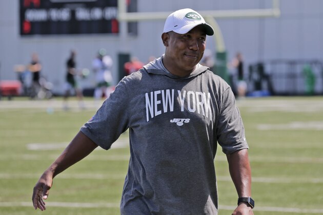 FILE - In this July 25, 2019, file photo, New York Jets coach Hines Ward comes off the field after a practice at the NFL football team's training camp in Florham Park, N.J. The New York Jets have hired former Pittsburgh Steelers wide receiver Hines Ward as a full-time offensive assistant. Ward worked with the Jets during the summer as a coaching intern and impressed coach Adam Gase and his staff.  (AP Photo/Seth Wenig, File)