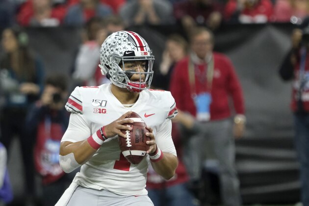 Ohio State quarterback Justin Fields looks for a receiver during the first half of the Big Ten championship NCAA college football game against Wisconsin, Saturday, Dec. 7, 2019, in Indianapolis. (AP Photo/AJ Mast) Ohio State quarterback Justin Fields looks for a receiver during the first half of the Big Ten championship NCAA college football game against Wisconsin, Saturday, Dec. 7, 2019, in Indianapolis. (AP Photo/AJ Mast)
