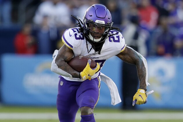 Minnesota Vikings running back Mike Boone runs with the ball during the second half of an NFL football game against the Los Angeles Chargers, Sunday, Dec. 15, 2019, in Carson, Calif. (AP Photo/Marcio Jose Sanchez)