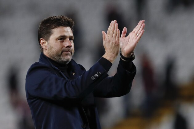 Tottenham's manager Mauricio Pochettino applauds fans after the Champions League group B soccer match between Red Star and Tottenham, at the Rajko Mitic Stadium in Belgrade, Serbia, Wednesday, Nov. 6, 2019. (AP Photo/Darko Vojinovic)