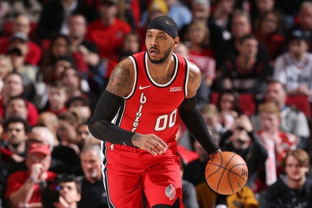 PORTLAND, OR - DECEMBER 20: Carmelo Anthony #00 of the Portland Trail Blazers handles the ball during the game against the Orlando Magic on December 20, 2019 at the Moda Center Arena in Portland, Oregon. NOTE TO USER: User expressly acknowledges and agrees that, by downloading and or using this photograph, user is consenting to the terms and conditions of the Getty Images License Agreement. Mandatory Copyright Notice: Copyright 2019 NBAE (Photo by Sam Forencich/NBAE via Getty Images)
