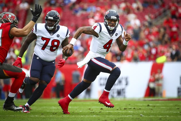 TAMPA, FL - DECEMBER 21: Deshaun Watson #4 of the Houston Texans runs with the ball during the first half against the Tampa Bay Buccaneers on December 21, 2019 at Raymond James Stadium in Tampa, Florida. (Photo by Will Vragovic/Getty Images)