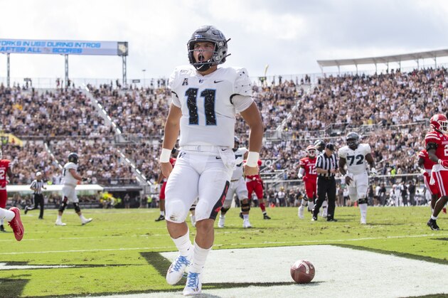 Central Florida quarterback Dillon Gabriel (11) celebrates after scoring against Houston  during the first half of an NCAA college football game in Orlando, Fla., Saturday, Nov. 2, 2019. (Photo/Willie J. Allen Jr.)