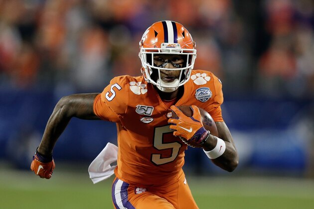 Clemson wide receiver Tee Higgins (5) runs against Virginia during the first half of the Atlantic Coast Conference championship NCAA college football game in Charlotte, N.C., Saturday, Dec. 7, 2019. (AP Photo/Gerry Broome)