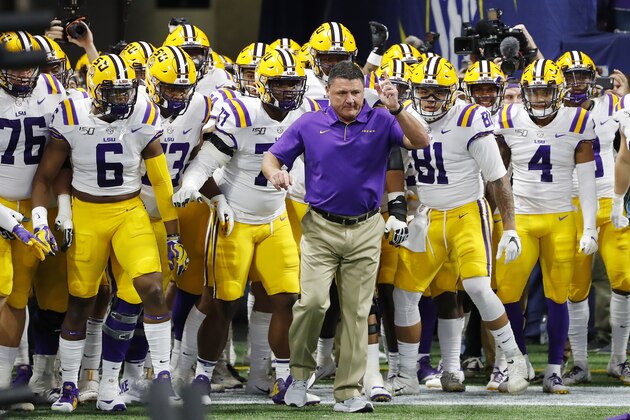 ATLANTA, GEORGIA - DECEMBER 07: Head coach Ed Orgeron of the LSU Tigers leads his team onto the field before the SEC Championship game against the Georgia Bulldogs at Mercedes-Benz Stadium on December 07, 2019 in Atlanta, Georgia. (Photo by Kevin C. Cox/Getty Images)