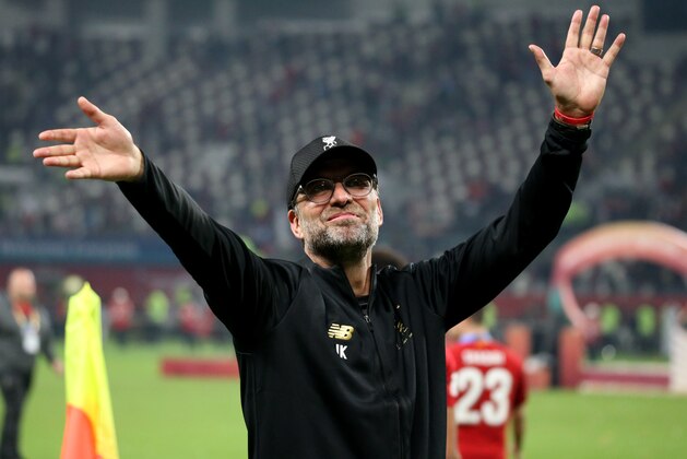 DOHA, QATAR - DECEMBER 21: Juergen Klopp, Head Coach of Liverpool greets the supporters after the FIFA Club World Cup Final Match between Liverpool FC and CR Flamengo at Khalifa International Stadium on December 21, 2019 in Doha, Qatar. (Photo by MB Media/Getty Images)