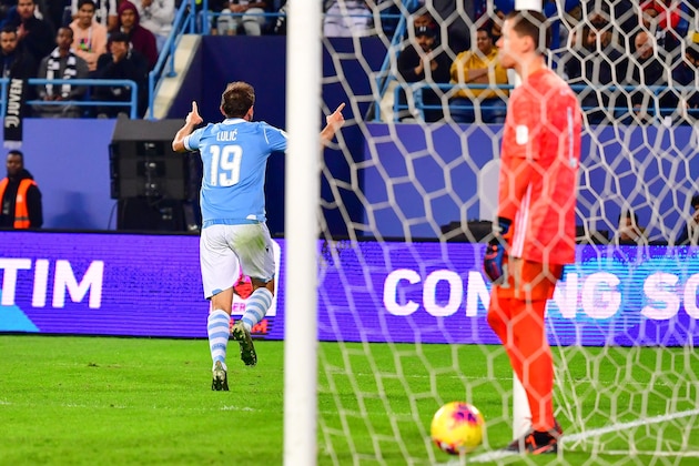 Lazio's Bosnian midfielder Senad Lulic (L) celebrates after scoring during the Supercoppa Italiana final football match between Juventus and Lazio at the King Saud University Stadium in the Saudi capital Riyadh on December 22, 2019. (Photo by GIUSEPPE CACACE / AFP) (Photo by GIUSEPPE CACACE/AFP via Getty Images)