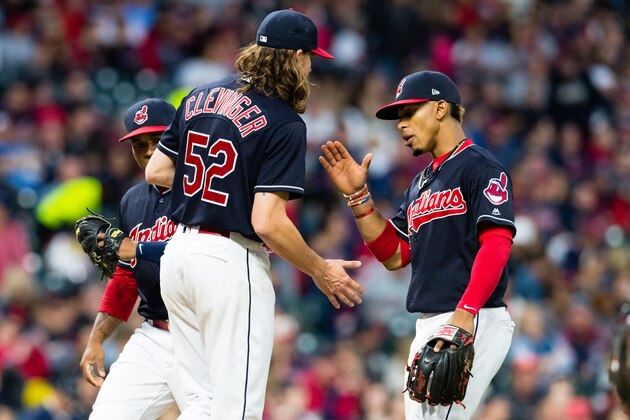 CLEVELAND, OH - MAY 26: Starting pitcher Mike Clevinger #52 celebrates with shortstop Francisco Lindor #12 of the Cleveland Indians as Clevenger leaves the game during the sixth inning against the Kansas City Royals at Progressive Field on May 26, 2017 in Cleveland, Ohio. (Photo by Jason Miller/Getty Images)