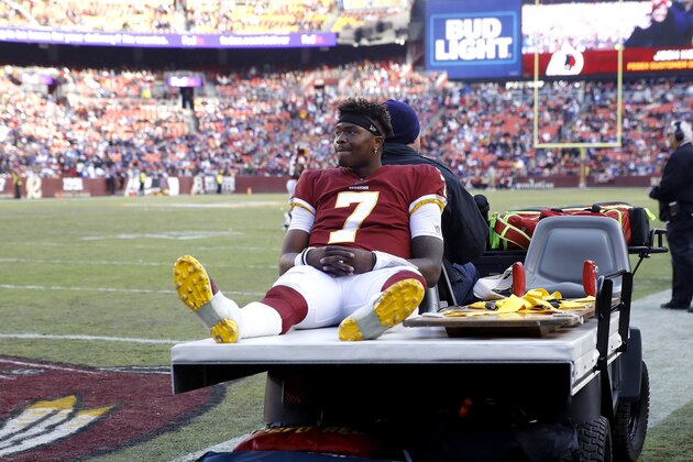 Washington Redskins quarterback Dwayne Haskins sits on cart while being taking off the field during the second half of an NFL football game against the New York Giants, Sunday, Dec. 22, 2019, in Landover, Md. (AP Photo/Patrick Semansky)
