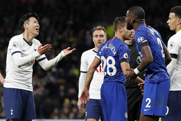Tottenham Hotspur's South Korean striker Son Heung-Min (L) appeals to Chelsea's German defender Antonio Rudiger (R) after the two players clash during the English Premier League football match between Tottenham Hotspur and Chelsea at Tottenham Hotspur Stadium in London, on December 22, 2019. (Photo by Adrian DENNIS / AFP) / RESTRICTED TO EDITORIAL USE. No use with unauthorized audio, video, data, fixture lists, club/league logos or 'live' services. Online in-match use limited to 120 images. An additional 40 images may be used in extra time. No video emulation. Social media in-match use limited to 120 images. An additional 40 images may be used in extra time. No use in betting publications, games or single club/league/player publications. /  (Photo by ADRIAN DENNIS/AFP via Getty Images)