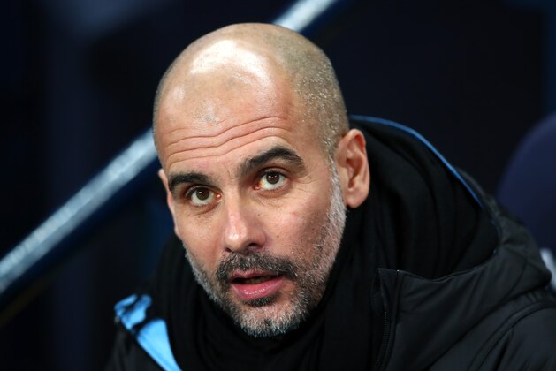 MANCHESTER, ENGLAND - DECEMBER 21: Pep Guardiola, Manager of Manchester City looks on prior to the Premier League match between Manchester City and Leicester City at Etihad Stadium on December 21, 2019 in Manchester, United Kingdom. (Photo by Clive Brunskill/Getty Images)