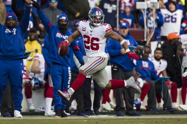 LANDOVER, MD - DECEMBER 22: Saquon Barkley #26 of the New York Giants carries the ball during the second half against the Washington Redskins at FedExField on December 22, 2019 in Landover, Maryland. (Photo by Scott Taetsch/Getty Images)