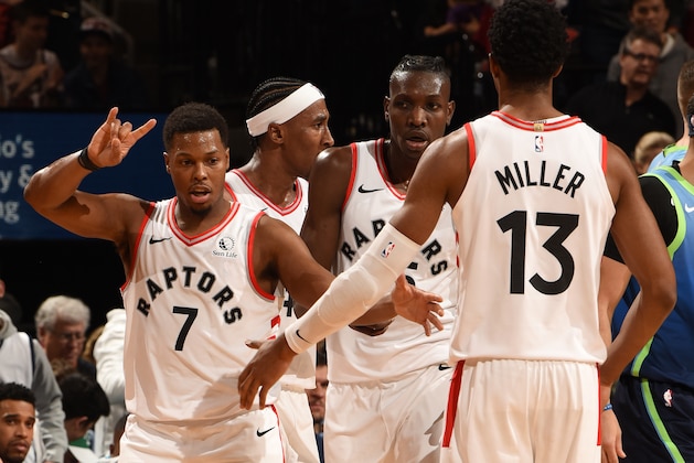 TORONTO, CANADA - DECEMBER 22: Kyle Lowry #7 of the Toronto Raptors high fives Malcolm Miller #13 of the Toronto Raptors during the game on December 22, 2019 at the Scotiabank Arena in Toronto, Ontario, Canada.  NOTE TO USER: User expressly acknowledges and agrees that, by downloading and or using this Photograph, user is consenting to the terms and conditions of the Getty Images License Agreement.  Mandatory Copyright Notice: Copyright 2019 NBAE (Photo by Ron Turenne/NBAE via Getty Images)