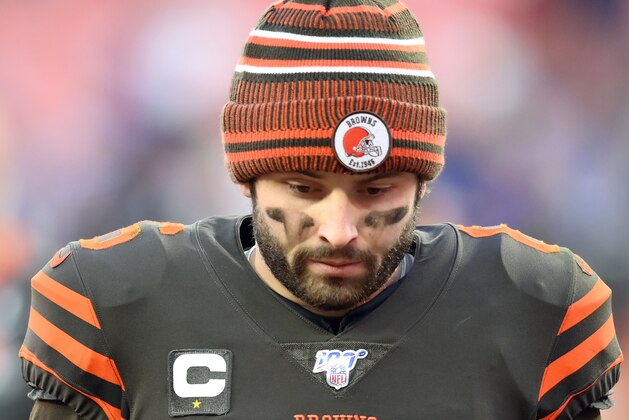 Cleveland Browns quarterback Baker Mayfield walks off the field after the Browns were defeated by the Baltimore Ravens 31-15 in an NFL football game, Sunday, Dec. 22, 2019, in Cleveland. (AP Photo/David Richard)