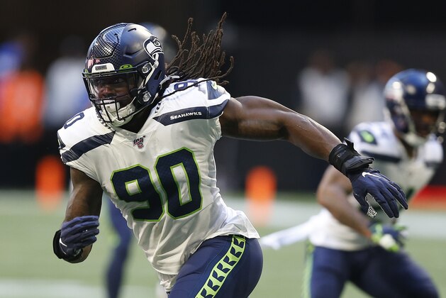 Seattle Seahawks defensive end Jadeveon Clowney (90) breaks off the line of scrimmage in a week 7 NFL football game against the Atlanta Falcons, Sunday, Sep. 27, 2019 in Atlanta. (Michael Zarrilli/AP Images for Panini, via AP)