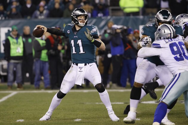 Philadelphia Eagles quarterback Carson Wentz throws a pass during the first half of an NFL football game against the Dallas Cowboys Sunday, Dec. 22, 2019, in Philadelphia. (AP Photo/Chris Szagola)