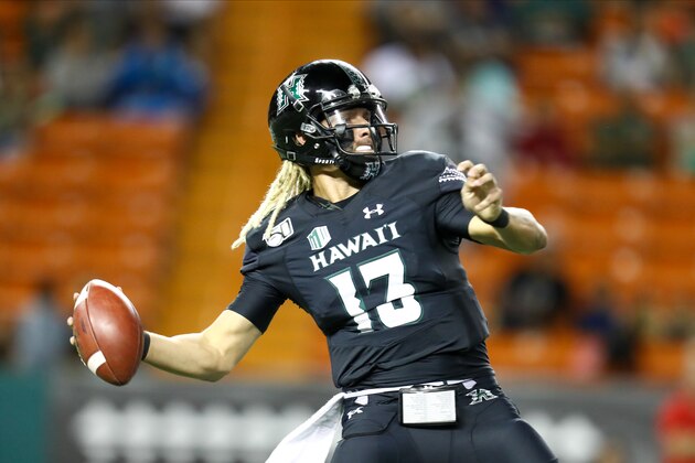 HONOLULU, HI - NOVEMBER 23: Cole McDonald #13 of the Hawaii hurls a pass downfield during the second quarter of the game against the San Diego State Aztecs at Aloha Stadium on November 23, 2019 in Honolulu, Hawaii. (Photo by Darryl Oumi/Getty Images)