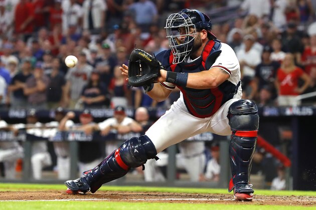 ATLANTA, GEORGIA - OCTOBER 03:  Francisco Cervelli #45 of the Atlanta Braves prepares to tag out Kolten Wong (not pictured) of the St. Louis Cardinals as he attempts to score a run during the eighth inning in game one of the National League Division Series at SunTrust Park on October 03, 2019 in Atlanta, Georgia. (Photo by Kevin C. Cox/Getty Images)