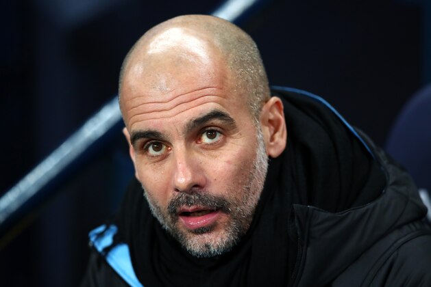 MANCHESTER, ENGLAND - DECEMBER 21: Pep Guardiola, Manager of Manchester City looks on prior to the Premier League match between Manchester City and Leicester City at Etihad Stadium on December 21, 2019 in Manchester, United Kingdom. (Photo by Clive Brunskill/Getty Images)