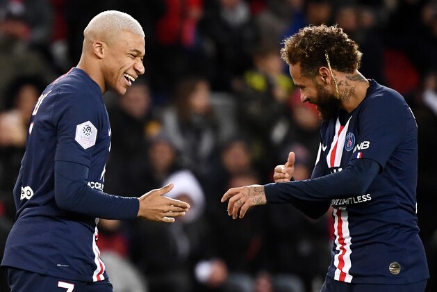 Paris Saint-Germain's French forward Kylian Mbappe (L) is congratuled by Paris Saint-Germain's Brazilian forward Neymar after scoring a goal during the French L1 football match between Paris Saint-Germain (PSG) and Amiens at the Parc des Princes stadium in Paris on December 21, 2019. (Photo by FRANCK FIFE / AFP) (Photo by FRANCK FIFE/AFP via Getty Images) Paris Saint-Germain's French forward Kylian Mbappe (L) is congratuled by Paris Saint-Germain's Brazilian forward Neymar after scoring a goal during the French L1 football match between Paris Saint-Germain (PSG) and Amiens at the Parc des Princes stadium in Paris on December 21, 2019. (Photo by FRANCK FIFE / AFP) (Photo by FRANCK FIFE/AFP via Getty Images)