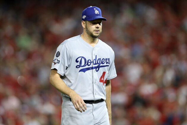 WASHINGTON, DC - OCTOBER 07: Rich Hill #44 of the Los Angeles Dodgers walks off the field after being pulled in the third inning against the Washington Nationals in game four of the National League Division Series at Nationals Park on October 07, 2019 in Washington, DC. (Photo by Rob Carr/Getty Images)