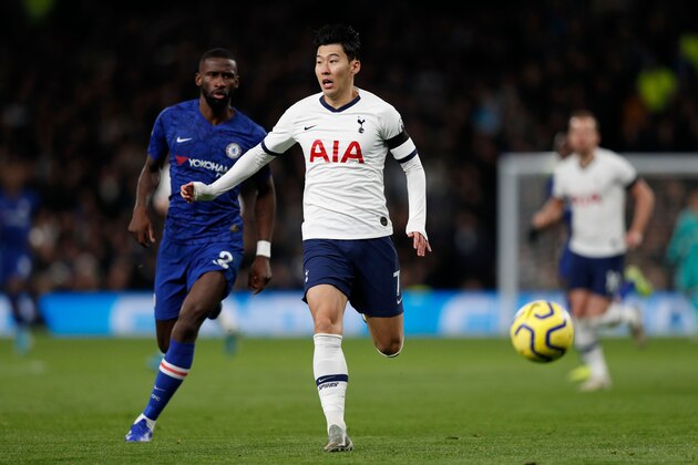 Tottenham Hotspur's South Korean striker Son Heung-Min (C) runs away from Chelsea's German defender Antonio Rudiger (L) during the English Premier League football match between Tottenham Hotspur and Chelsea at Tottenham Hotspur Stadium in London, on December 22, 2019. (Photo by Adrian DENNIS / AFP) / RESTRICTED TO EDITORIAL USE. No use with unauthorized audio, video, data, fixture lists, club/league logos or 'live' services. Online in-match use limited to 120 images. An additional 40 images may be used in extra time. No video emulation. Social media in-match use limited to 120 images. An additional 40 images may be used in extra time. No use in betting publications, games or single club/league/player publications. / (Photo by ADRIAN DENNIS/AFP via Getty Images) Tottenham Hotspur's South Korean striker Son Heung-Min (C) runs away from Chelsea's German defender Antonio Rudiger (L) during the English Premier League football match between Tottenham Hotspur and Chelsea at Tottenham Hotspur Stadium in London, on December 22, 2019. (Photo by Adrian DENNIS / AFP) / RESTRICTED TO EDITORIAL USE. No use with unauthorized audio, video, data, fixture lists, club/league logos or 'live' services. Online in-match use limited to 120 images. An additional 40 images may be used in extra time. No video emulation. Social media in-match use limited to 120 images. An additional 40 images may be used in extra time. No use in betting publications, games or single club/league/player publications. / (Photo by ADRIAN DENNIS/AFP via Getty Images)
