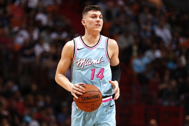 MIAMI, FL - DECEMBER 23: Tyler Herro #14 of the Miami Heat handles the ball during a game against the Utah Jazz on December 23, 2019 at American Airlines Arena in Miami, Florida. NOTE TO USER: User expressly acknowledges and agrees that, by downloading and or using this Photograph, user is consenting to the terms and conditions of the Getty Images License Agreement. Mandatory Copyright Notice: Copyright 2019 NBAE (Photo by Issac Baldizon/NBAE via Getty Images)