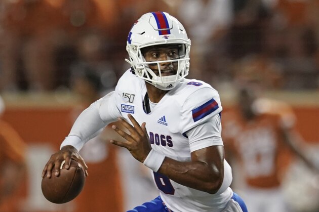 Louisiana Tech's J'Mar Smith (8) looks to pass against Texas during the first half of an NCAA college football game in Austin, Texas, Saturday, Aug. 31, 2019. (AP Photo/Chuck Burton)