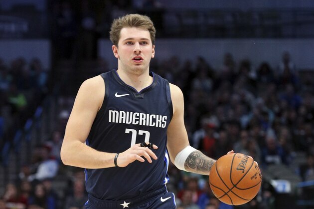 Dallas Mavericks forward Luka Doncic (77) dribbles the ball down the court in an NBA basketball game against the Minnesota Timberwolves Wednesday, Dec. 4, 2019, in Dallas. (AP Photo/Richard W. Rodriguez)