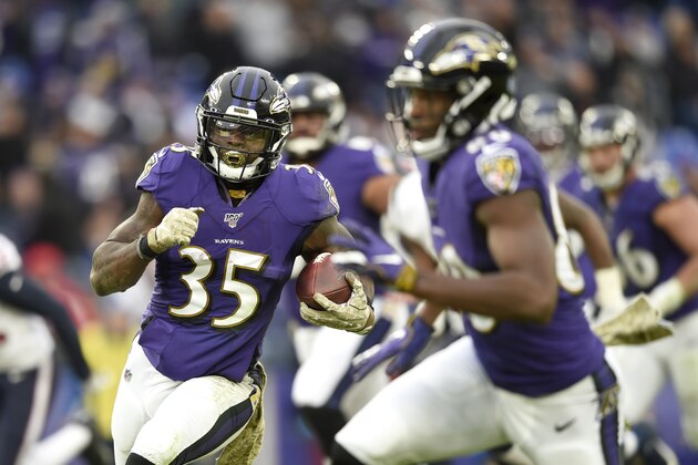 Baltimore Ravens running back Gus Edwards runs for a touchdown against the Houston Texans during the second half of an NFL football game, Sunday, Nov. 17, 2019, in Baltimore. (AP Photo/Gail Burton)
