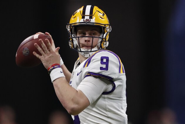 LSU quarterback Joe Burrow (9) works against Georgia during the second half of the Southeastern Conference championship NCAA college football game, Saturday, Dec. 7, 2019, in Atlanta. (AP Photo/John Bazemore) LSU quarterback Joe Burrow (9) works against Georgia during the second half of the Southeastern Conference championship NCAA college football game, Saturday, Dec. 7, 2019, in Atlanta. (AP Photo/John Bazemore)