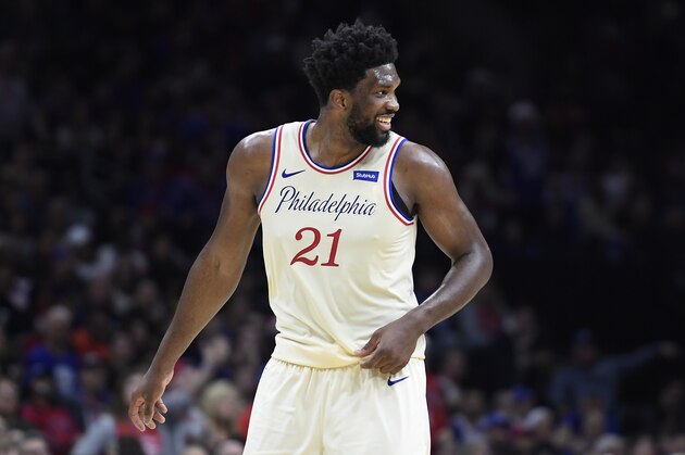 PHILADELPHIA, PENNSYLVANIA - DECEMBER 25: Joel Embiid #21 of the Philadelphia 76ers reacts during the second half of the game against the Milwaukee Bucks at Wells Fargo Center on December 25, 2019 in Philadelphia, Pennsylvania. The Philadelphia 76ers won 121-109. NOTE TO USER: User expressly acknowledges and agrees that, by downloading and or using this photograph, User is consenting to the terms and conditions of the Getty Images License Agreement. (Photo by Sarah Stier/Getty Images)