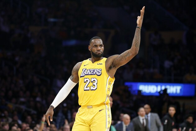 Los Angeles Lakers' LeBron James reacts after making a 3-pointer during the second half of the team's NBA basketball game against the Los Angeles Clippers on Wednesday, Dec. 25, 2019, in Los Angeles. The Clippers won 111-106. (AP Photo/Ringo H.W. Chiu)