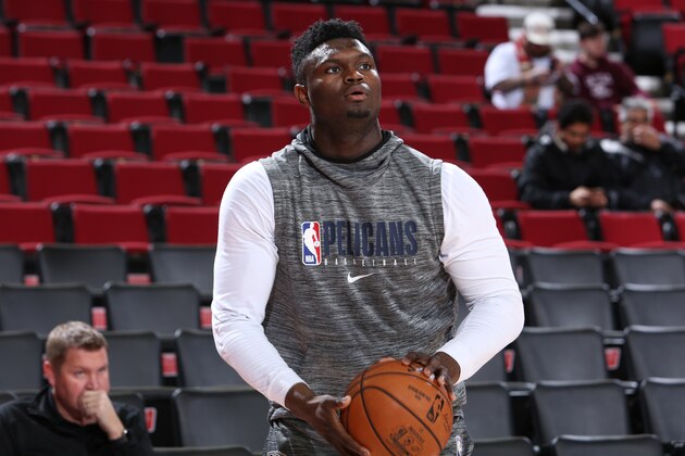 PORTLAND, OR - DECEMBER 23: Zion Williamson #1 of the New Orleans Pelicans warms up before the game against the New Orleans Pelicans on December 23, 2019 at the Moda Center in Portland, Oregon. NOTE TO USER: User expressly acknowledges and agrees that, by downloading and or using this Photograph, user is consenting to the terms and conditions of the Getty Images License Agreement. Mandatory Copyright Notice: Copyright 2019 NBAE (Photo by Sam Forencich/NBAE via Getty Images)