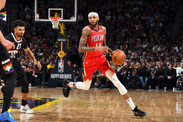 DENVER, CO - DECEMBER 25: Brandon Ingram #14 of the New Orleans Pelicans handles the ball during the game against the Denver Nuggets on December 25, 2019 at the Pepsi Center in Denver, Colorado. NOTE TO USER: User expressly acknowledges and agrees that, by downloading and/or using this Photograph, user is consenting to the terms and conditions of the Getty Images License Agreement. Mandatory Copyright Notice: Copyright 2019 NBAE (Photo by Garrett Ellwood/NBAE via Getty Images)
