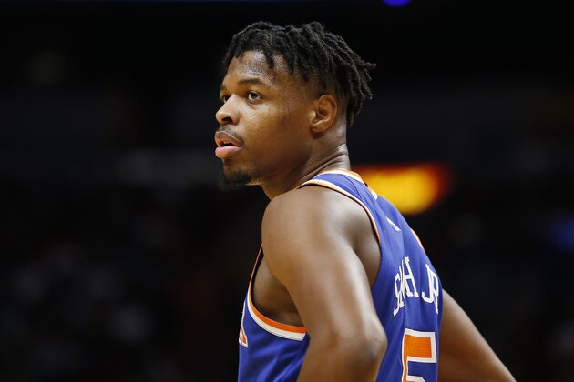 MIAMI, FLORIDA - DECEMBER 20:  Dennis Smith Jr. #5 of the New York Knicks looks on against the Miami Heat during the second half at American Airlines Arena on December 20, 2019 in Miami, Florida. NOTE TO USER: User expressly acknowledges and agrees that, by downloading and/or using this photograph, user is consenting to the terms and conditions of the Getty Images License Agreement.  (Photo by Michael Reaves/Getty Images)