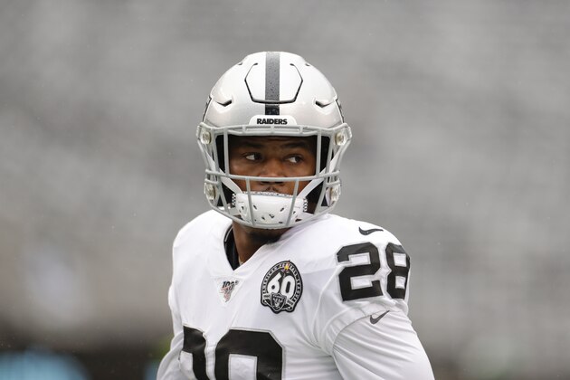 Oakland Raiders' Josh Jacobs (28) warms up before an NFL football game against the New York Jets Sunday, Nov. 24, 2019, in East Rutherford, N.J. (AP Photo/Adam Hunger)
