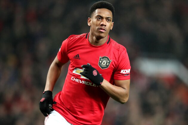 MANCHESTER, ENGLAND - DECEMBER 26: Anthony Martial of Manchester United celebrates scoring his team's fourth goal during the Premier League match between Manchester United and Newcastle United at Old Trafford on December 26, 2019 in Manchester, United Kingdom. (Photo by Ian MacNicol/Getty Images)
