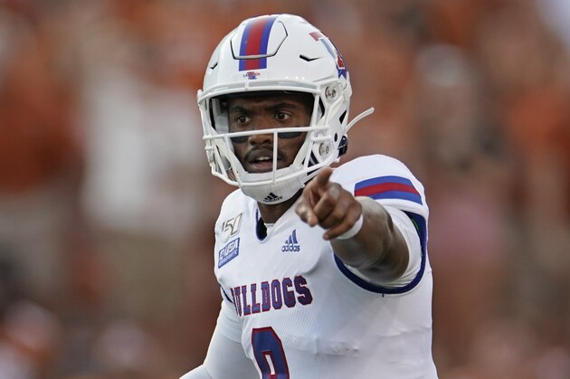 Louisiana Tech's J'Mar Smith (8) directs his team against Texas during the first half of an NCAA college football game in Austin, Texas, Saturday, Aug. 31, 2019. (AP Photo/Chuck Burton)