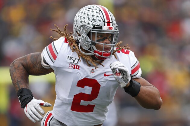 Ohio State defensive end Chase Young plays against Michigan in the first half of an NCAA college football game in Ann Arbor, Mich., Saturday, Nov. 30, 2019. (AP Photo/Paul Sancya)