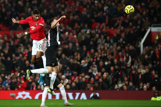 MANCHESTER, ENGLAND - DECEMBER 26: Marcus Rashford of Manchester United scores his team's third goal during the Premier League match between Manchester United and Newcastle United at Old Trafford on December 26, 2019 in Manchester, United Kingdom. (Photo by Clive Brunskill/Getty Images)