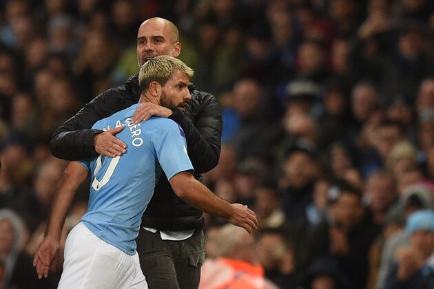 Manchester City's Spanish manager Pep Guardiola (R) embraces Manchester City's Argentinian striker Sergio Aguero (L) on the touchline during the English Premier League football match between Manchester City and Southampton at the Etihad Stadium in Manchester, north west England, on November 2, 2019. (Photo by Oli SCARFF / AFP) / RESTRICTED TO EDITORIAL USE. No use with unauthorized audio, video, data, fixture lists, club/league logos or 'live' services. Online in-match use limited to 120 images. An additional 40 images may be used in extra time. No video emulation. Social media in-match use limited to 120 images. An additional 40 images may be used in extra time. No use in betting publications, games or single club/league/player publications. /  (Photo by OLI SCARFF/AFP via Getty Images)
