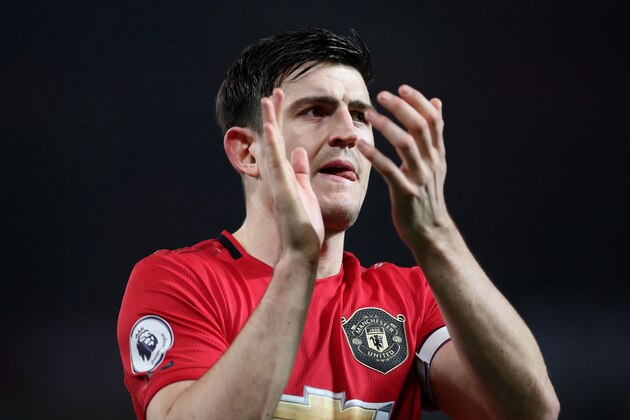 MANCHESTER, ENGLAND - DECEMBER 26: Harry Maguire of Manchester United applauds fans after the Premier League match between Manchester United and Newcastle United at Old Trafford on December 26, 2019 in Manchester, United Kingdom. (Photo by Ian MacNicol/Getty Images)