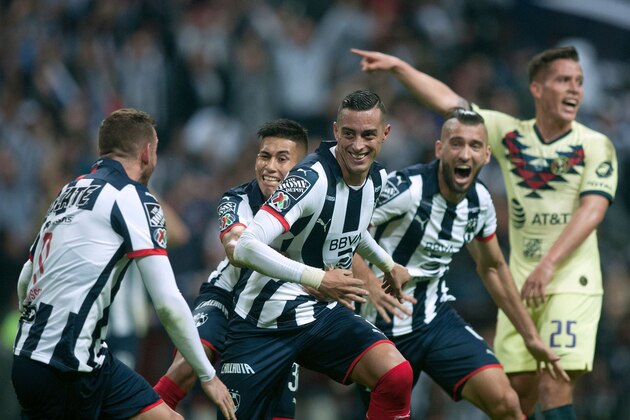 Monterrey's Rogelio Funes Mori (C) celebrates withe teammates after scoring against America during the Mexican Apertura 2019 tournament first leg final football, match at the BBVA Bancomer stadium in Monterrey, Mexico, on December 26, 2019. (Photo by Julio Cesar AGUILAR / AFP) (Photo by JULIO CESAR AGUILAR/AFP via Getty Images)