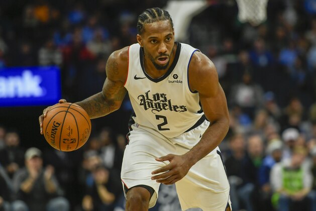 Los Angeles Clippers forward Kawhi Leonard drives to the basket against the Minnesota Timberwolves during the second half of an NBA basketball game Friday, Dec. 13, 2019, in Minneapolis. (AP Photo/Craig Lassig)