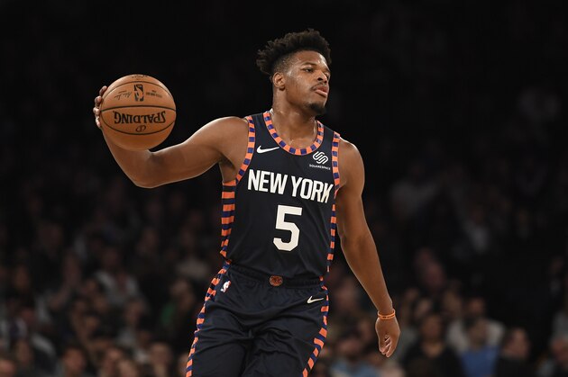 New York Knicks guard Dennis Smith Jr. (5) dribbles the ball during the first half of an NBA basketball game against the Boston Celtics, Sunday, Dec. 1, 2019, in New York. (AP Photo/Sarah Stier)