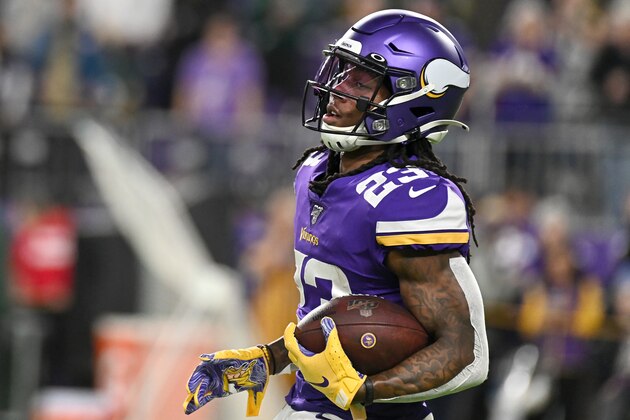 MINNEAPOLIS, MINNESOTA - DECEMBER 23: Running back Mike Boone #23 of the Minnesota Vikings warms up before the game against the Green Bay Packers at U.S. Bank Stadium on December 23, 2019 in Minneapolis, Minnesota. (Photo by Stephen Maturen/Getty Images)